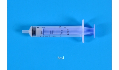 Sterile low frictional force syringes for single use